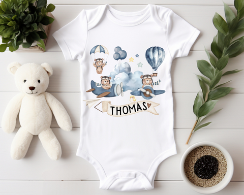 'IT'S PLANE TO SEE YOU'RE THE CUTEST'PERSONALISED BABY GROW